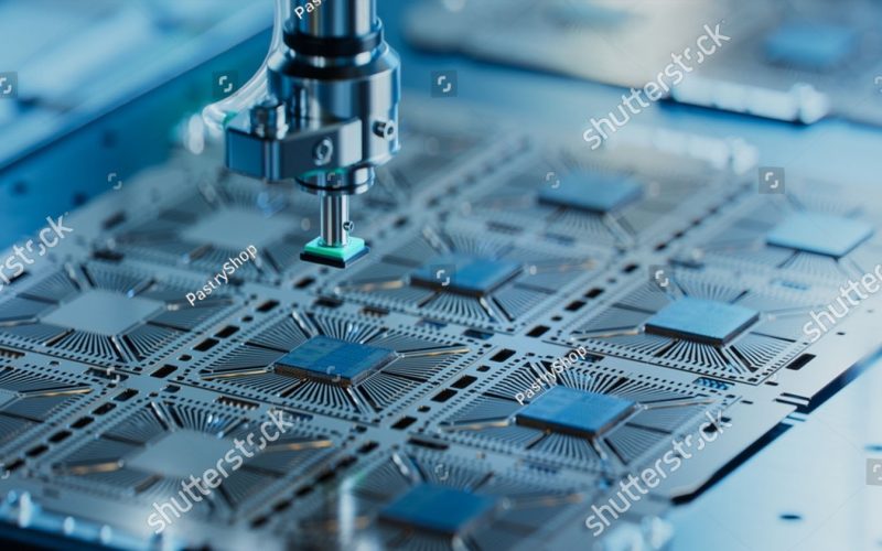 stock-photo-close-up-of-silicon-die-are-being-extracted-from-semiconductor-wafer-and-attached-to-substrate-by-2262331365